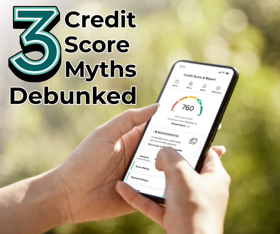 Person holding phone in hands showing credit score on the screen.