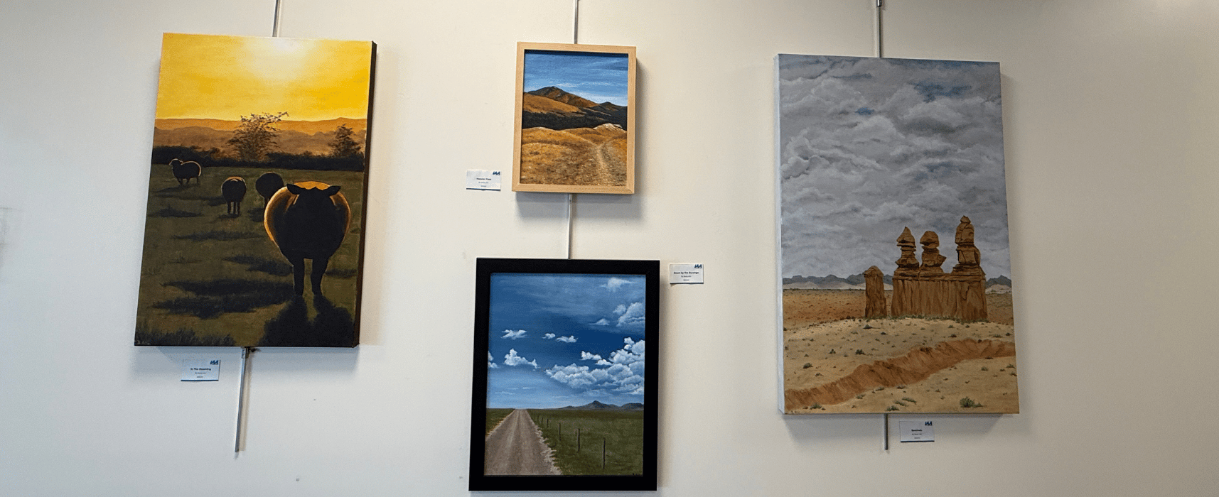 Becky Altic Artist Q4 2026 White Wall Becky Altic's artwork on display in IAA Credit Union lobby.