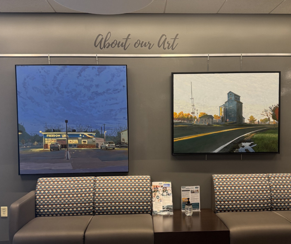 Artist Doug Johnson's paintings on display in IAACU lobby.
