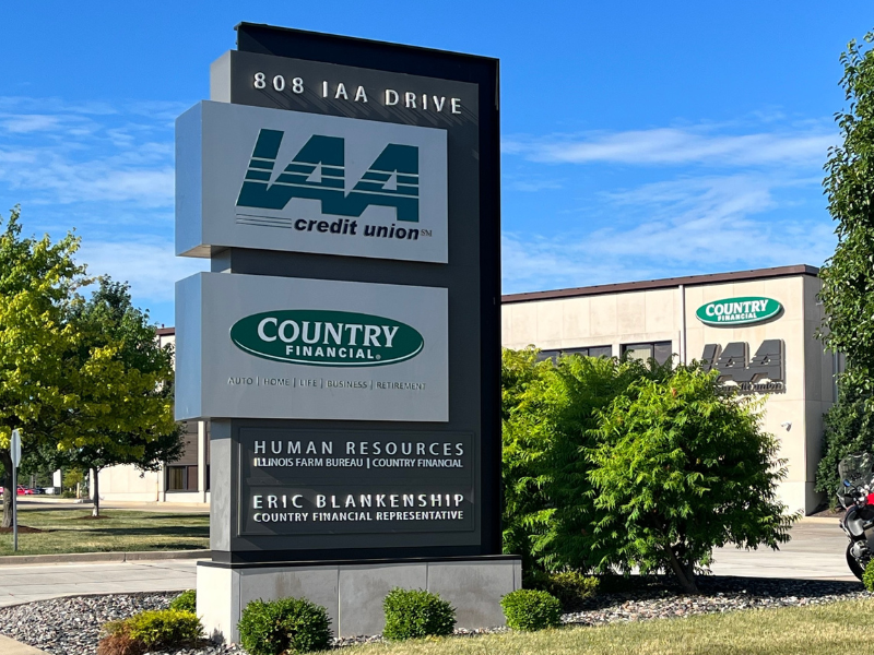 Outside view of the IAA Credit Union sign and building.
