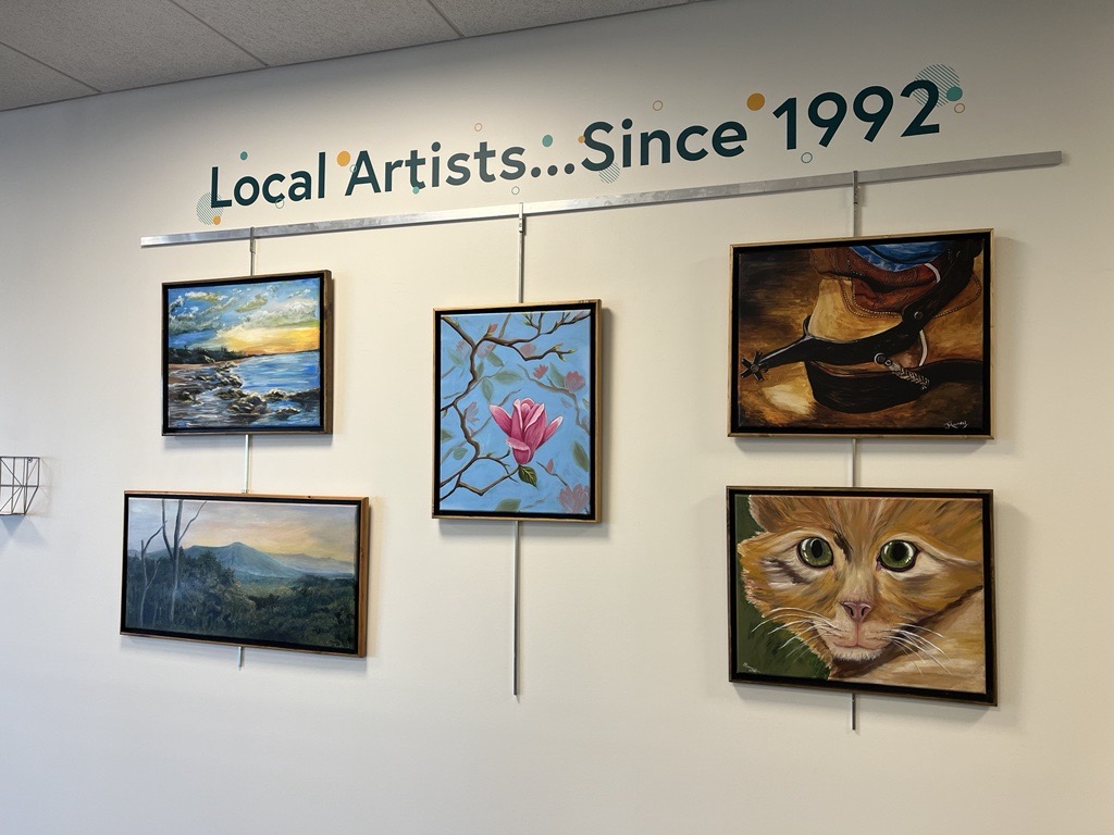 Joan Maney's artwork on display in IAACU Lobby.